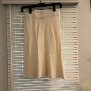 Cream skirt, mid-length